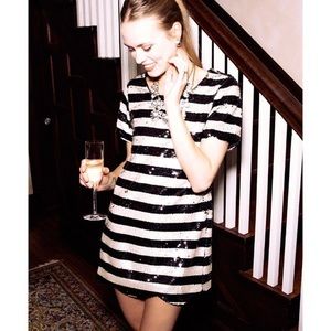 Black and gold scalloped sequin mini dress